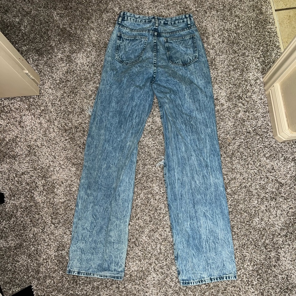 light wash ripped boot cut jeans